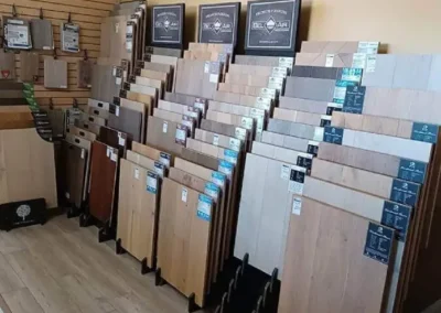 Assortment of wooden flooring samples displayed in a store