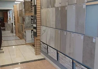 Interior of a tile store displaying various ceramic and porcelain tiles